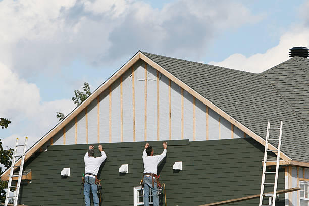 Professional Siding technician working in Newport, PA